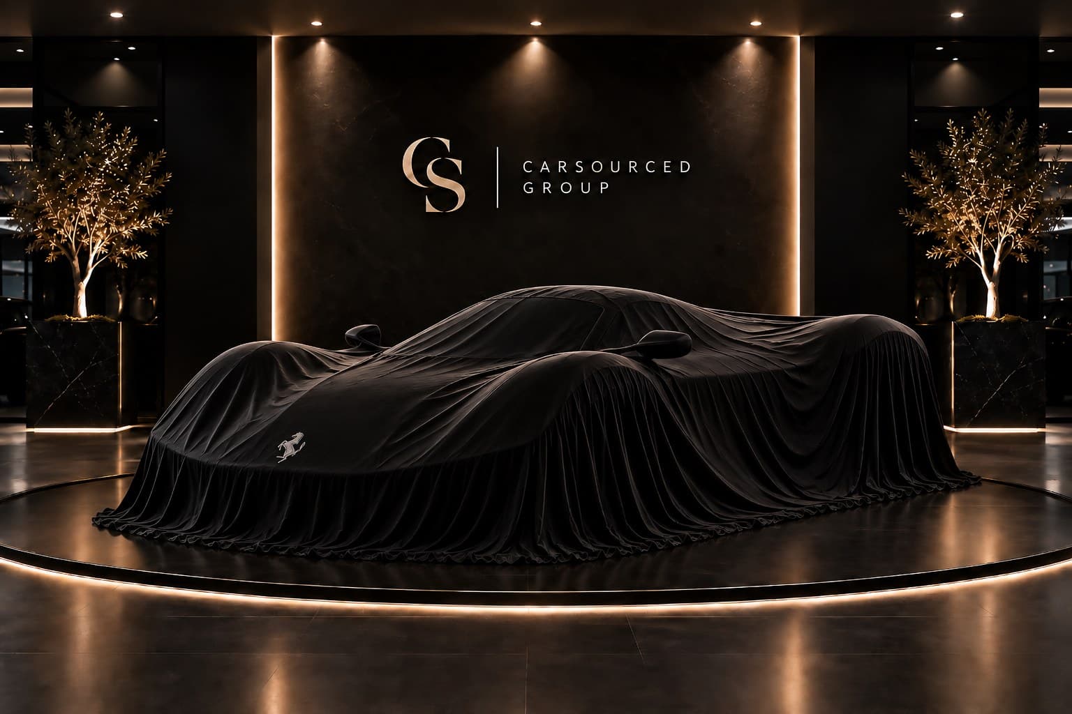 The Ferrari Daytona SP3 under a cover on the CarSourced Group stand, shown because the vehicle itself is not disclosed before a letter of intent
