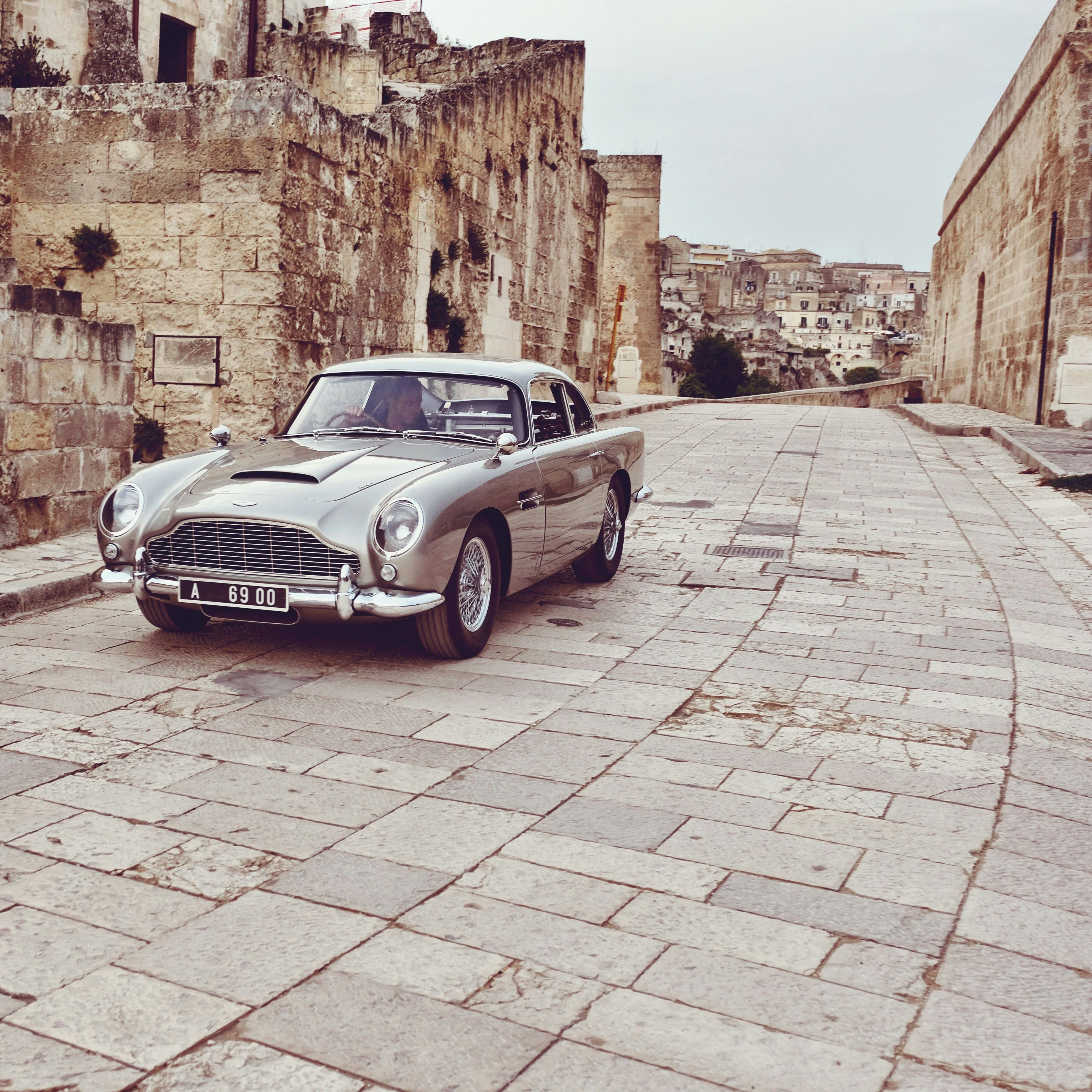 An Aston Martin DB5, shown as an example of the classic and vintage cars we source